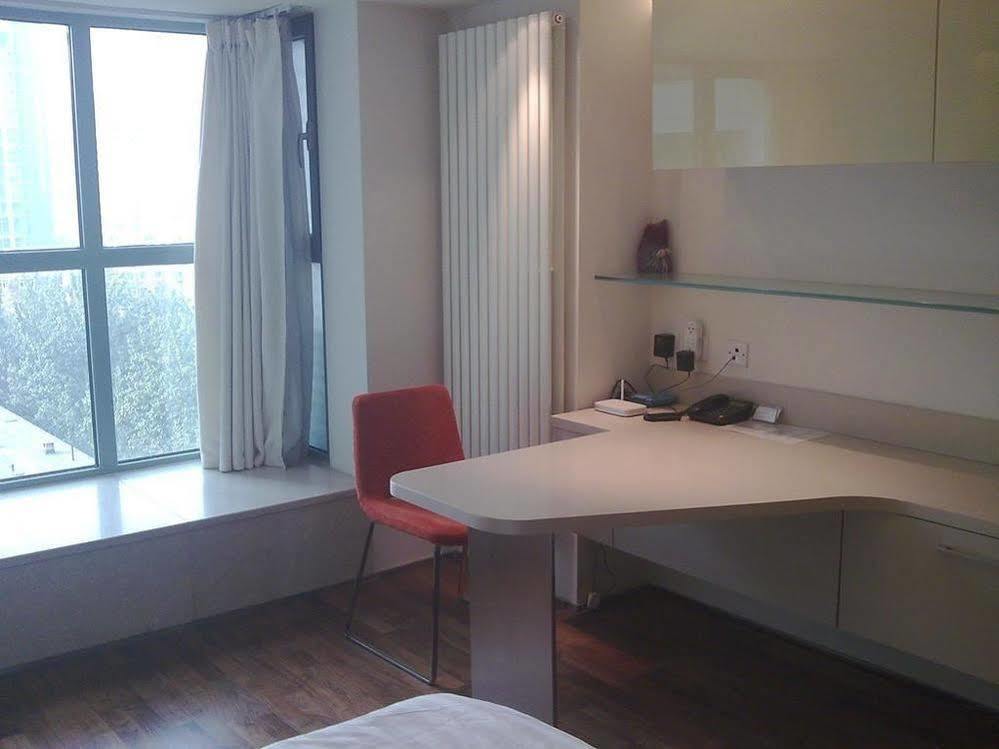 Seasons Park Apart Hotel Пекин Экстерьер фото