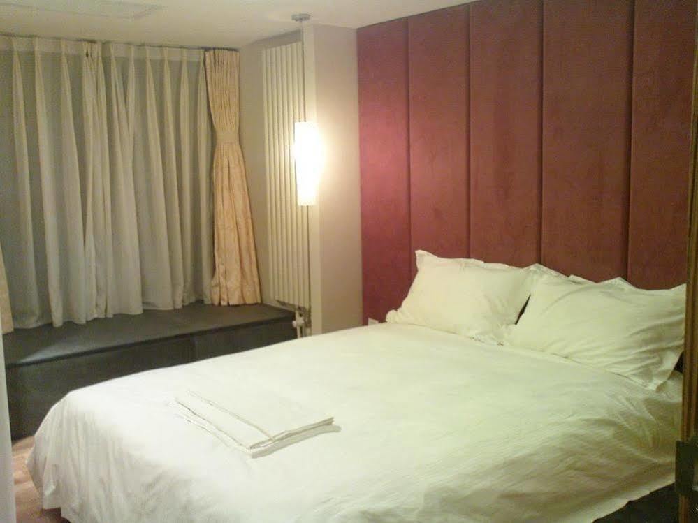 Seasons Park Apart Hotel Пекин Экстерьер фото